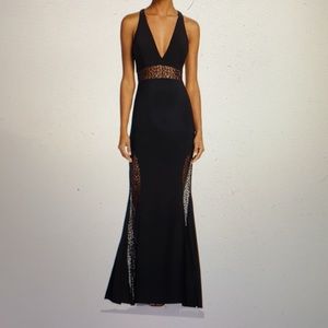 AQUA floor length mermaid gown.